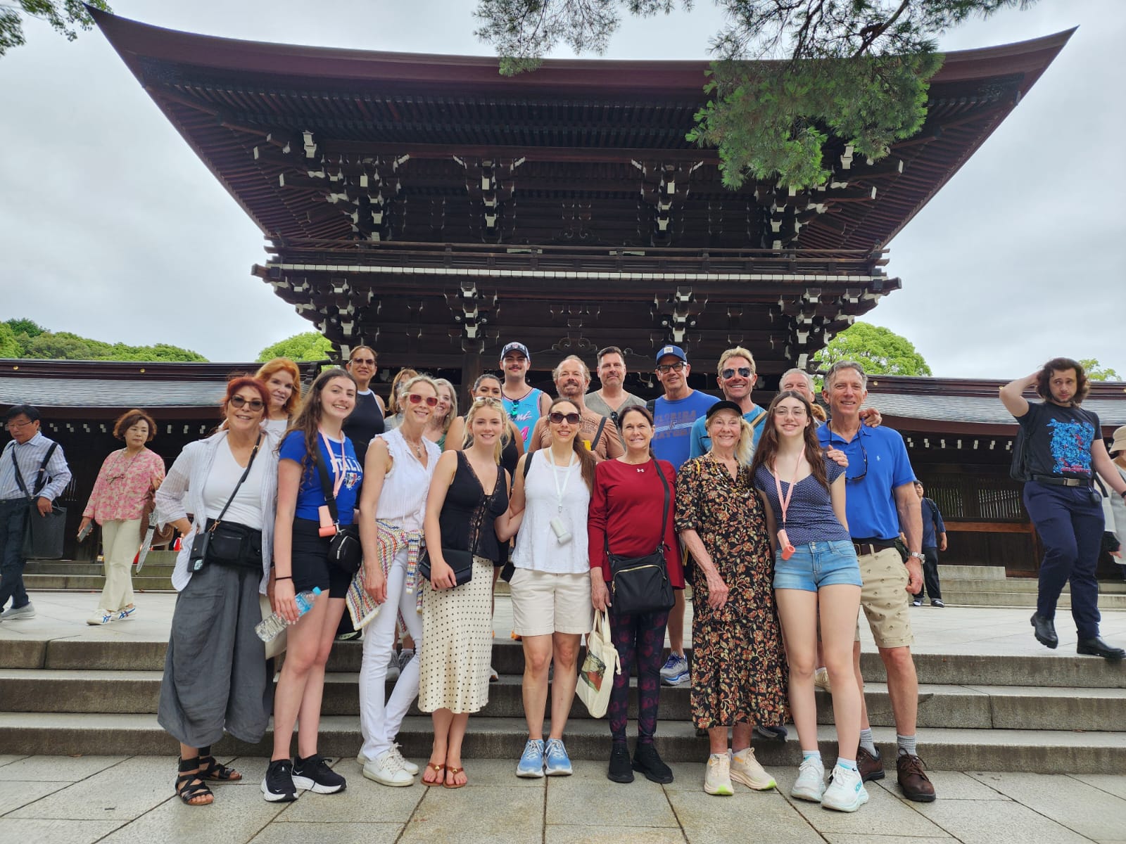 Smiling guests in Asakusa street with Skytree